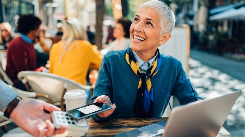 woman making mobile payment