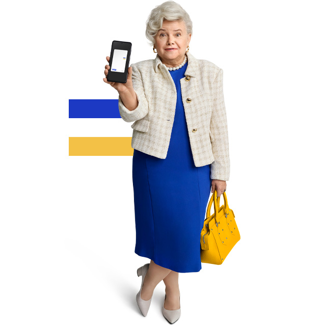 lady holding a bag and a mobile with visa card 